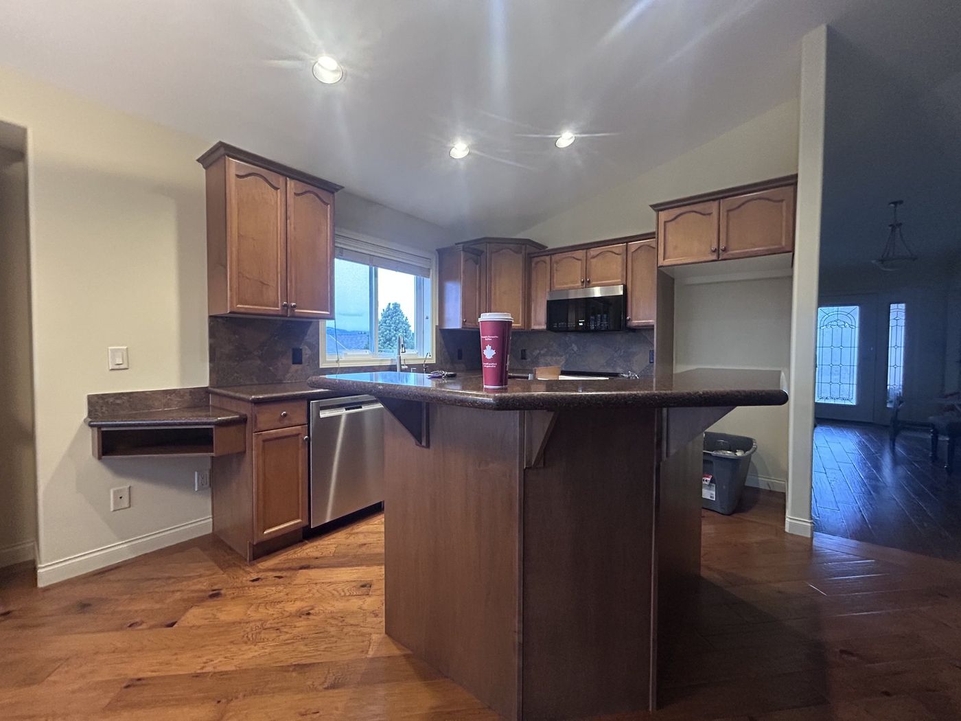Kelowna kitchen before refacing — oak cathedral doors