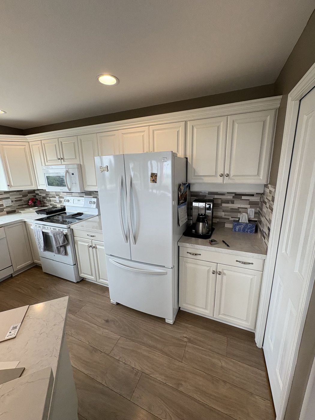 White raised-panel kitchen in Kelowna