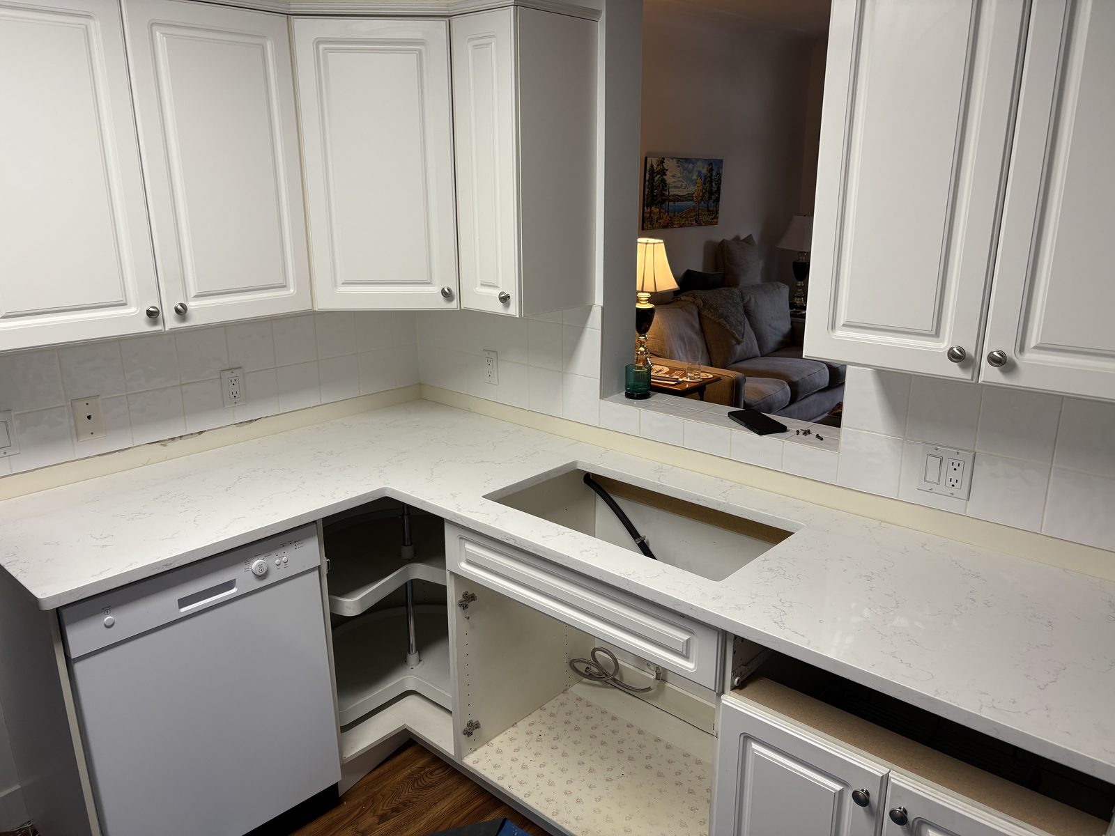 Kelowna kitchen counter after — white marble-look quartz