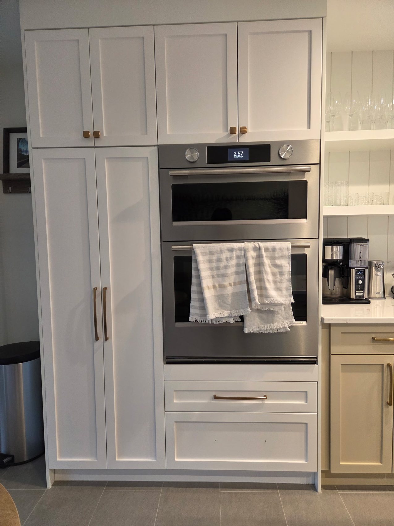 Kelowna kitchen after built-in oven tower cabinetry